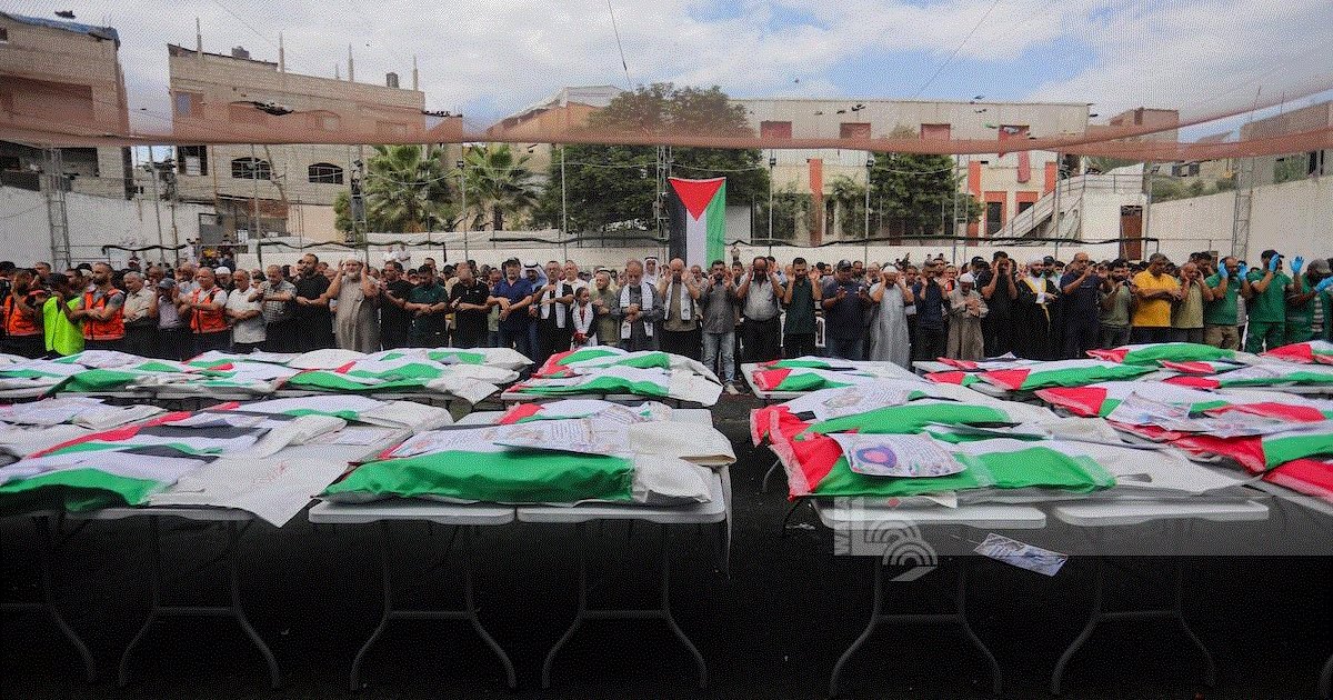 تشييع جثامين 75 شهيدا من تحت أنقاض مبانٍ في حي الدرج بمدينة غزة